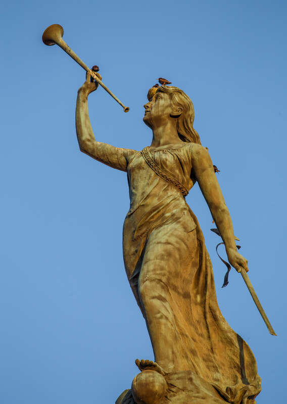 The Call to Arms, a 17-foot bronze statue of the Goddess Columbia. She stands atop the Soldiers and Sailors Monument in Troy, New York. Designed by artist James E. Kelly of New York City.