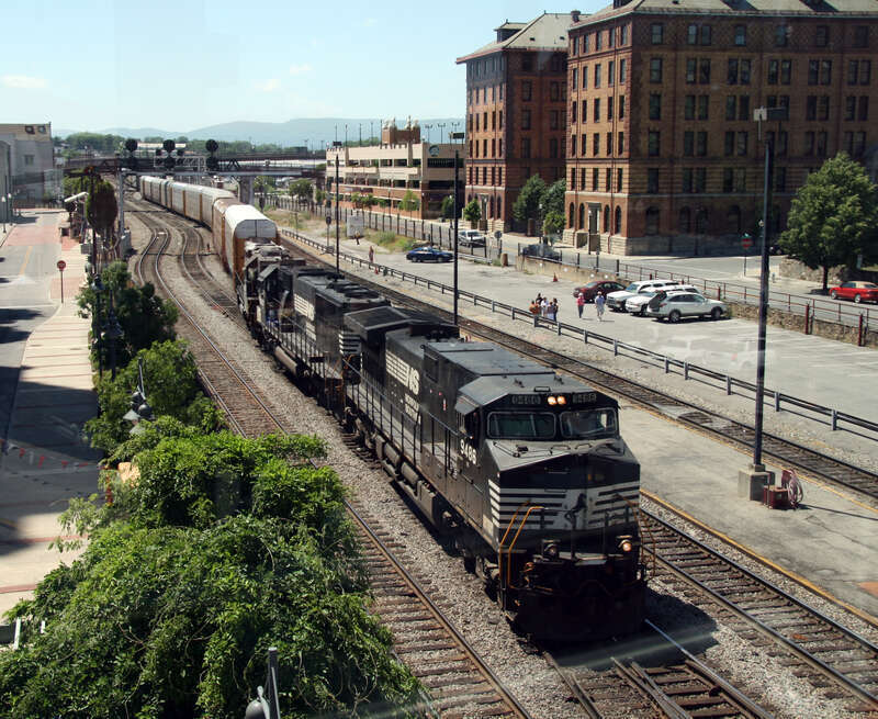 A NS train is seen from the pedestrian walkway above the tracks in Roanoke, VA.  This particular walkway is completly enclosed by glass so some reflection is visible.