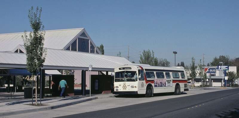TriMet's Tigard Transit Center in 1988, about eight months after its opening (on January 10 of that year).  Bus 425, a 1972 Flxible &quot;New Look&quot; bus, is bound for Lake Oswego TC on line 78.  In the background is a sign for Greyhound Lines, which had a