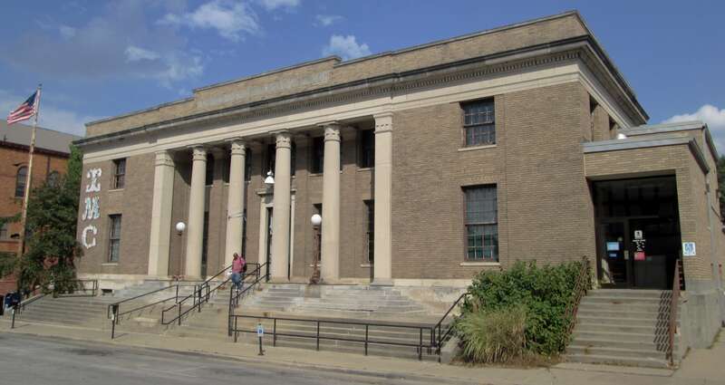 The U. S. Post Office, at 202 South Broadway Avenue in Urbana, Illinois, was built in 1914 and was designed by Oscar Wendroth in the Classical Revival style. The building was purchased by the Urbana Champaign Independent Media Center to be a