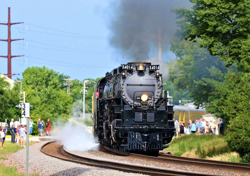 Union Pacific 4014 &quot;Big Boy&quot; (Alco 4-8-8-4) is Eastbound on the UP Clinton Sub seen here at the Kellogg Avenue Crossing North of Gilchrist Street in Ames, Iowa.
Car/Power List:
4014 - Alco 4-8-8-4
814 - Joe Jordan
809 - Jim Adams
3025 -