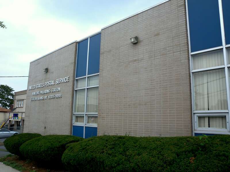 Looking north from Tompkins Avenue at Palladino post office on a cloudy midday.
