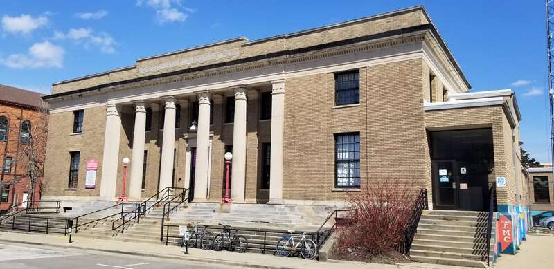 Urbana-Champaign Independent Media Center, located at 202 South Broadway Avenue in Urbana, Illinois, United States, in the former U. S. Post Office building