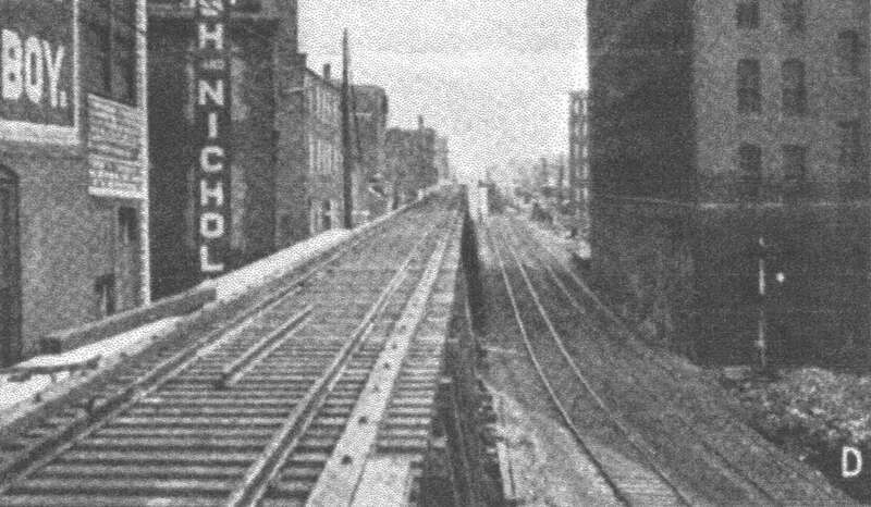 View east from Market Street during grade crossing elimination in Lynn in the 1910s. At right are the temporary surface-level tracks; at left is a temporary single-track trestle connecting the partially-built raised tracks to the old tracks.