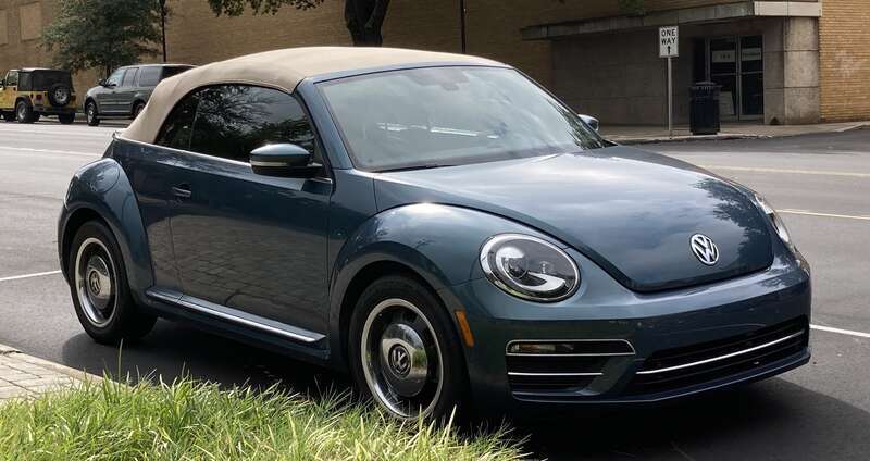 The front view of a blue convertible Volkswagen Beetle