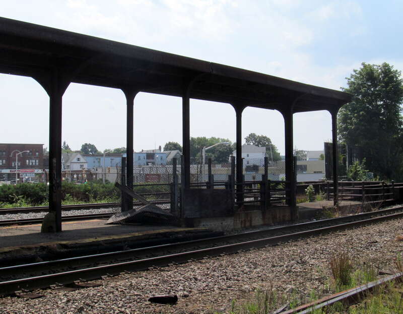 The south/west end of island platform at the former Lawrence station in August 2012, with the stairs to Parker Street visible