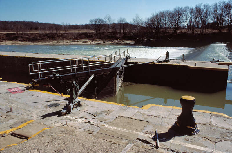 Looking E from near upper gates of Lock No. 2
This lock is 145 feet long and 38 feet wide, with about a 14 foot lift.
The two shrouded electric motors have cogs which engage notches on the beams attached to the lock gates, enabling them to be opened