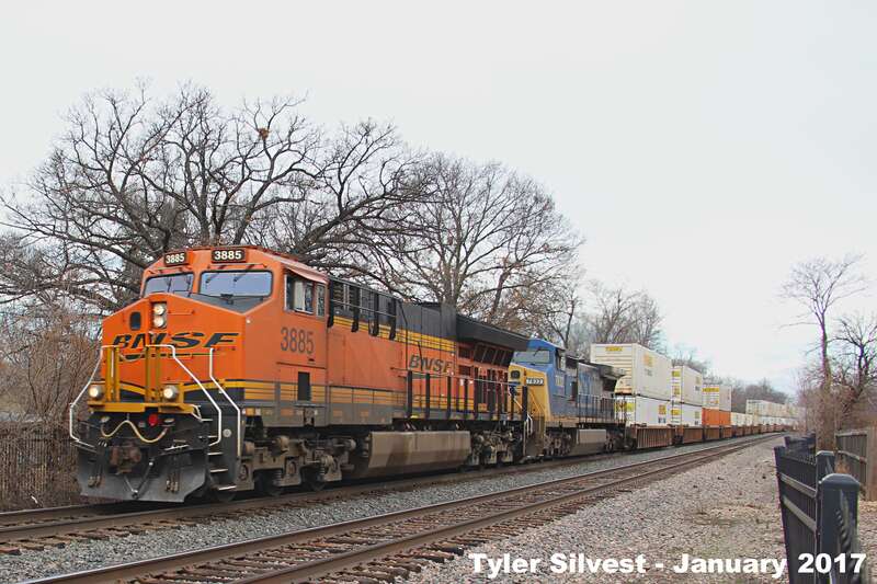 Burlington Northern Santa Fe 3885(ET44C4) and CSX 7832(C40-8W) Leading a Westbound Intermodal on the Emporia Sub near the Santa Fe Street crossing in Olathe, KS.
Video Link: 
Photo Taken: 1-22-17 at 11:51 am

Picture ID# 7142