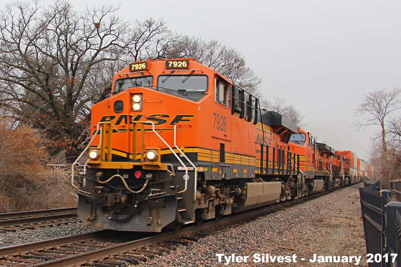 Burlington Northern Santa Fe 7926(ES44C4), 5353(C44-9W), 7185(ES44C4) and 4026(C44-9W) Leading a Westbound Intermodal on the Emporia Sub near the Santa Fe Street crossing in Olathe, KS.
Video Link: 
Photo Taken: 1-20-17 at 9:27 am

Picture ID# 6980