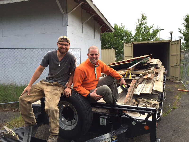 Historian Chris Bell (right) helped Salem Salvage load up the old wood that isn’t being used in the historic Salem Railroad Baggage Depot project — much of the material is being refurbished and re-used or re-purposed. Dating back to 1918 (re-built