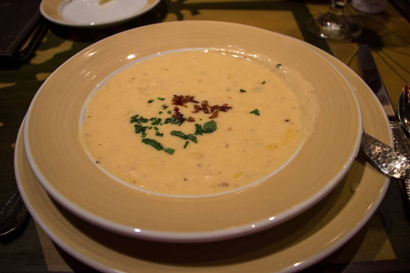 My entree at Storyteller's Cafe: Charred Nebraska Corn Chowder - With Rotisserie Chicken, Bacon, and Cilantro. Soooooooooo delicious.