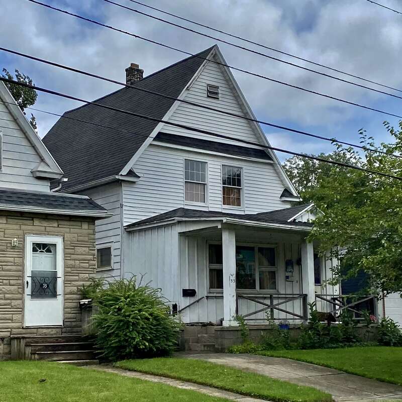 As seen in July 2021: the house at 33 Hines Street in Buffalo, New York is unusual in that, despite its intended usage as partially prefabricated modular housing for working-class renters, it's a single-family residence, rather than one of the