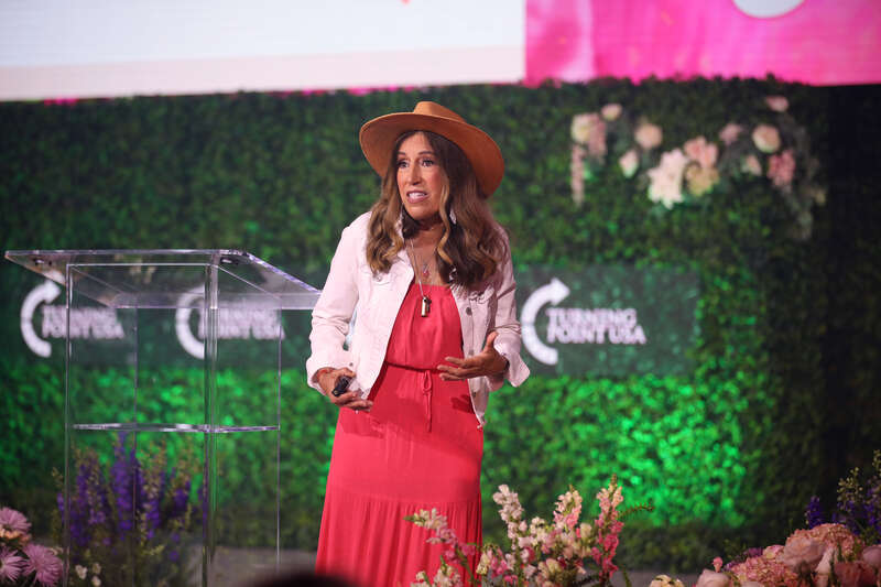 Hilda Labrada Gore speaking with attendees at the 2024 Young Women's Leadership Summit at the San Antonio Marriott Rivercenter on the River Walk in San Antonio, Texas.