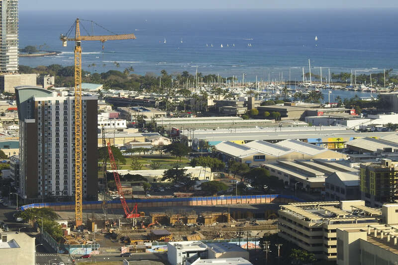 Preparation for the construction of Keahou Place as seen from downtown.