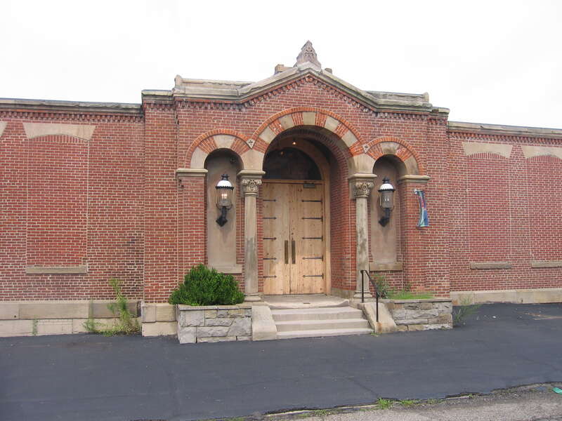 A view of the entrance to the Lawrence Public School building, now adapted for industrial use, in the Lawrenceville neighborhood of Pittsburgh, Pennsylvania.