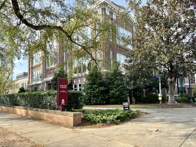 Built in 1911, this Classical Revival-style building was designed by Edwards and Walter to serve as the McMaster School, a segregated whites-only public school.  The building features a red brick exterior, a rusticated base, one-over-one windows, a