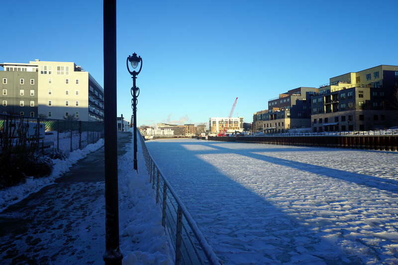 The Milwaukee Riverwalk and the Milwaukee River in Milwaukee, Wisconsin (United States).