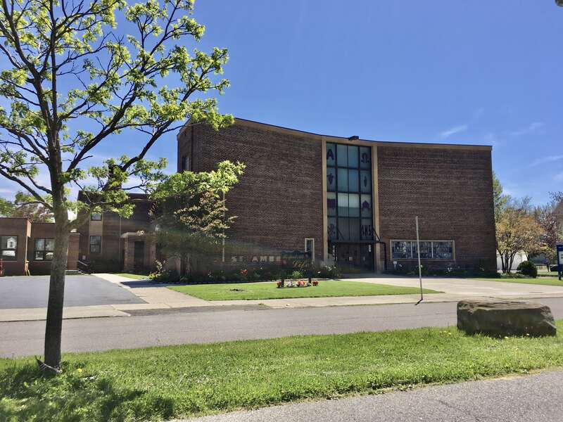 The St. Ambrose worship site of Our Lady of Charity RC Church, 65 Ridgewood Road, Buffalo, New York, May 2020. St. Ambrose was one of the last new Catholic parishes in Buffalo to be established (excepting those created during the late-2000s &quot;Journey
