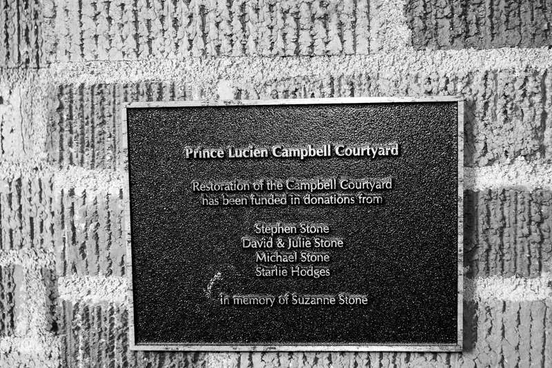 A commemorative plaque in the Prince Lucien Campbell Courtyard at the Jordan Schnitzer Museum of Art