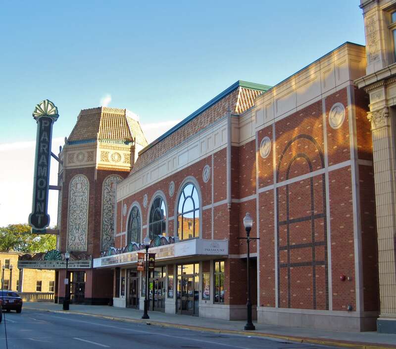 Paramount Theatre in Aurora (1931). It was part of a string of theaters commissioned by Paramount Pictures that were built to cater to the new &quot;Talkies&quot;. It was the first air conditioned building in the state outside of Chicago. The Marx Brothers,