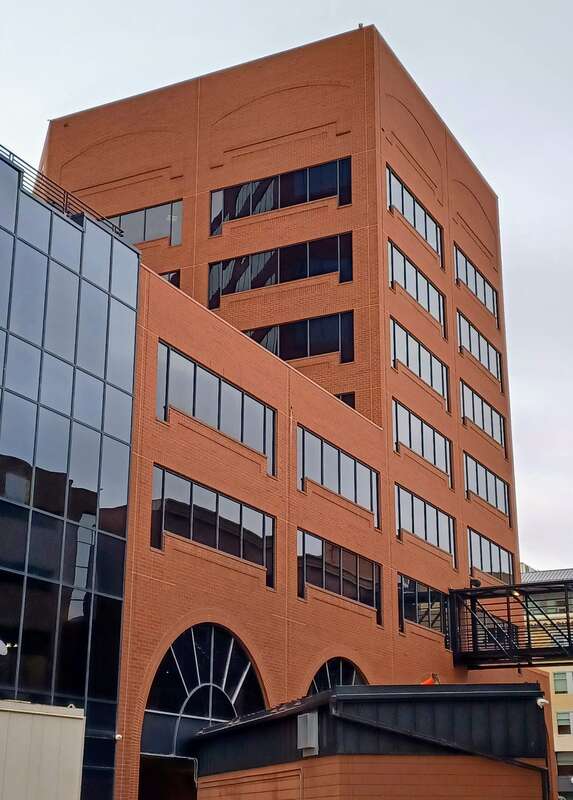 Plaza of the Rockies - North Tower, SE corner from the alley