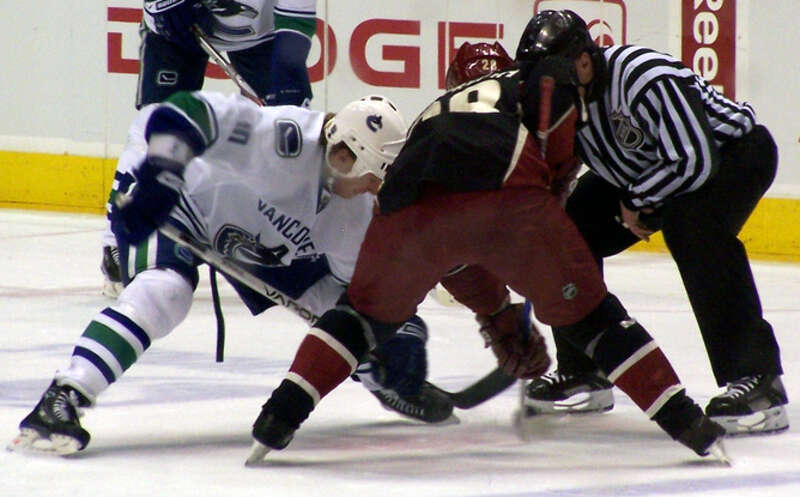 Vancouver Canucks forward Ryan Johnson takes a faceoff in a game against the Phoenix Coyotes on March 21, 2000.