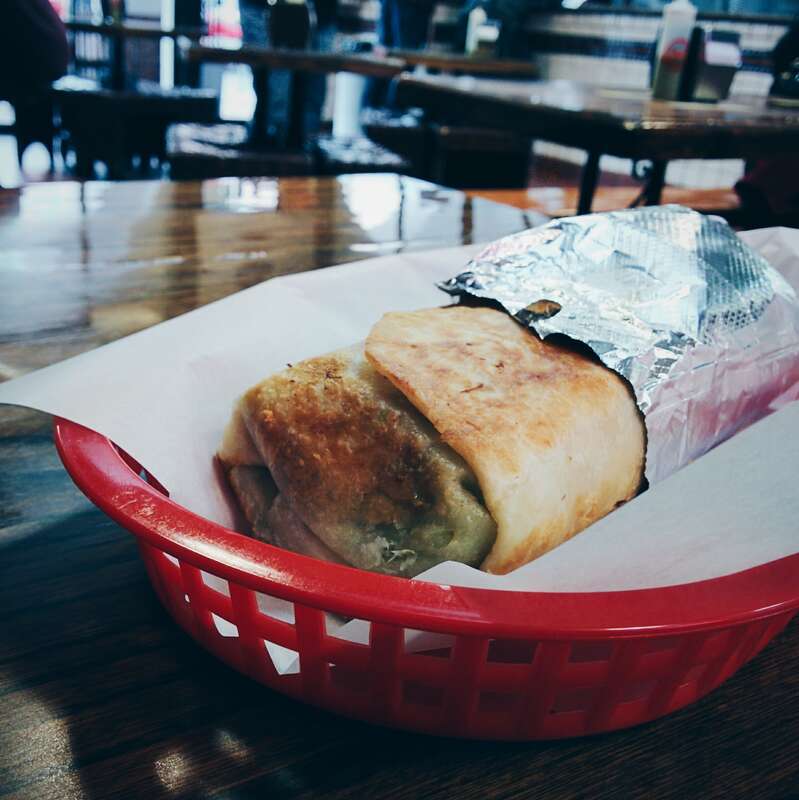 Since my last visit to SF, La Taqueria (the best taco joint in the Mission) went and won America's Best Burrito so it's now super-busy.
This is the pork burrito, with the (now less-so) secret option of toasting so it's crispy.

The tacos at La Taq
