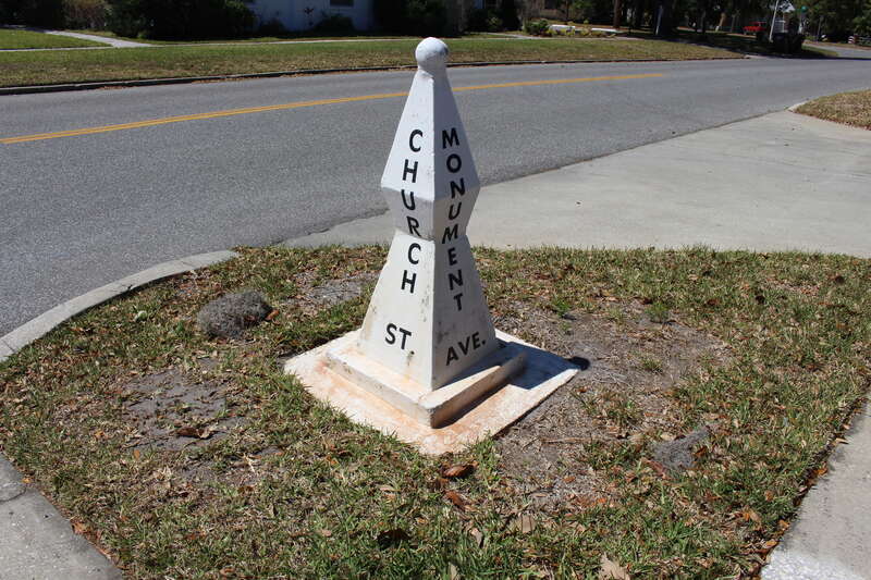 Concrete street sign, Church St Monument Ave, Kissimmee, Kissimmee, Osceola County, Florida