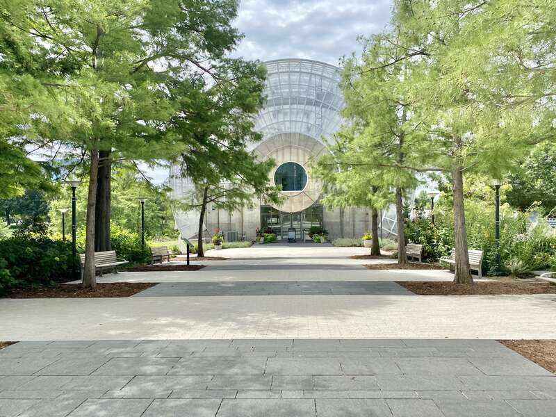 Built in 1983-1985, this Modern building was designed by Conklin and Rossant as part of the construction of the Myriad Botanical Gardens, which began construction in 1971.  The building consists of a large cylinder that is 224 feet (68 meters) long