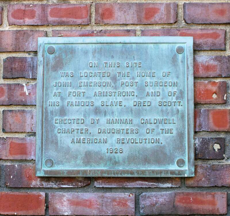 Dred Scott plaque on the Crane Company Building in Downtown Davenport, Iowa. This was the location of Dr. Emerson's home where Scott was held as a slave even though the Wisconsin Territory, of which Iowa was then a part of, was a slave-free