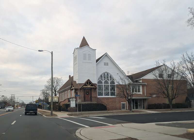 Photo of westbound U.S. Route 30 (White Horse Pike) in Egg Harbor City, New Jersey showing Emmanuel Church. Photo taken looking northwest between 5th Terrace and Liverpool Avenue.