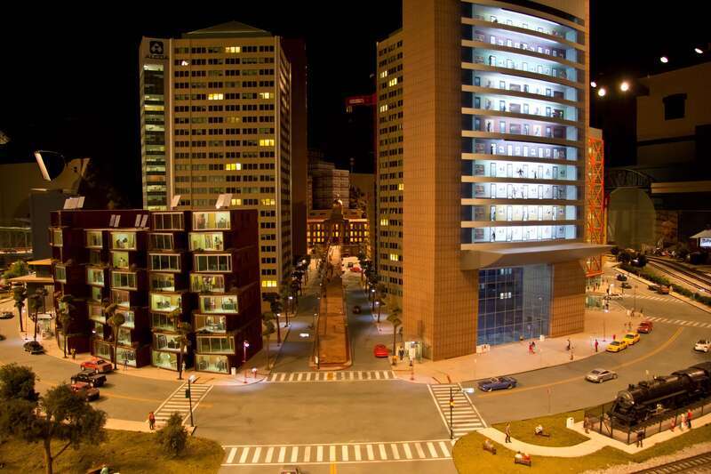 It’s a fairly quiet evening on this street on the EnterTRAINment Junction layout in West Chester, OH (just north of Cincinnati)

www.entertrainmentjunction.com/