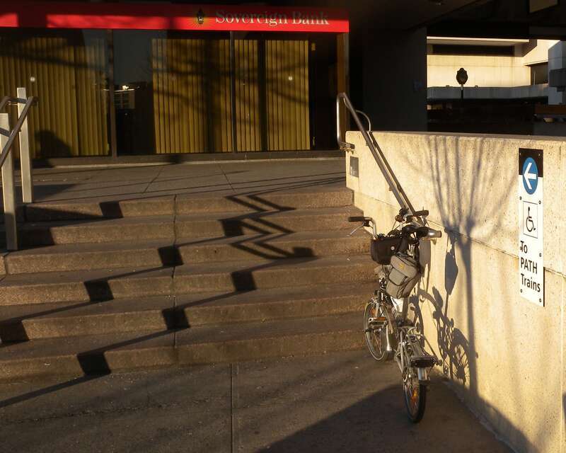 Looking east at staircase for wheelchair access on a sunny late afternoon.