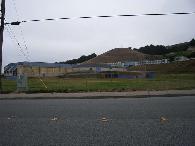 In the San Francisco Bay Area, almost all populated communities face the bay, rather than the Pacific Ocean. It is just too foggy and chilly on the oceanic side, at all times of the year.

Pacifica is one of the few communities on the ocean. I am