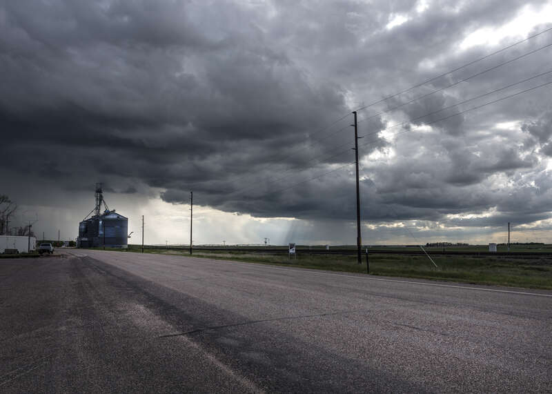 Title: Ominous clouds above Pine Bluffs, a small farming community on the Nebraska border in Laramie County, Wyoming
Physical description: 1 photograph : digital, tiff file, color.

Notes: Forms part of: Gates Frontiers Fund Wyoming Collection within