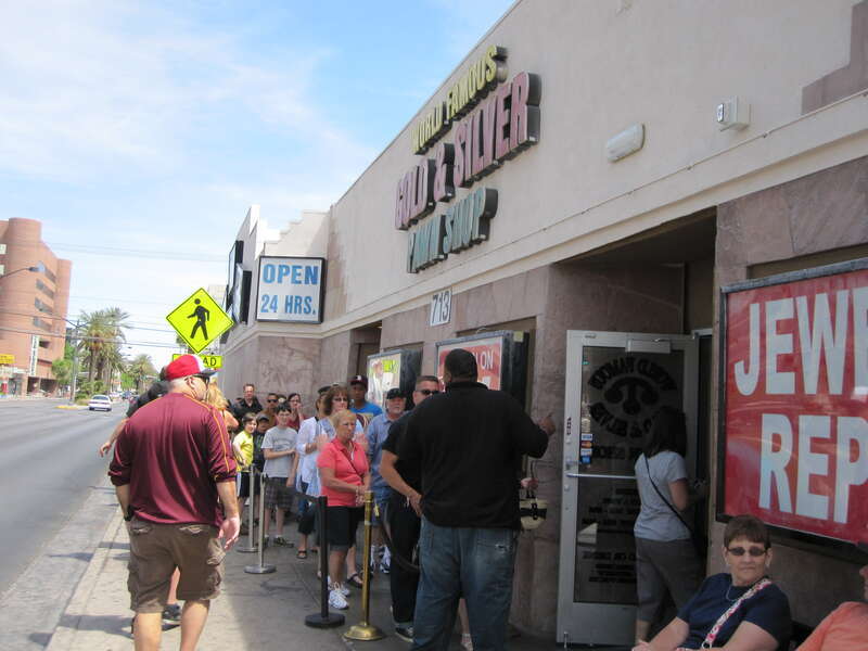 Close up of the exterior entrance to the shop used as the filming site for the American reality television series Pawn Stars. (The Gold and Silver Pawn shop in Las Vegas). Since becoming a tourist attraction, a bouncer controls the flow of