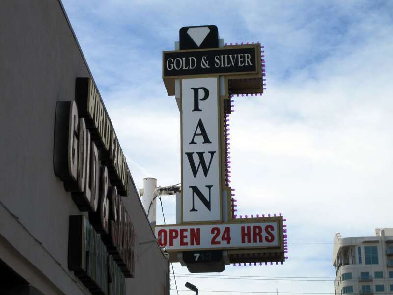 Exterior sign located outside of the door to the shop use at the filming site for the American reality television series Pawn Stars. (The Gold and Silver Pawn shop in Las Vegas)