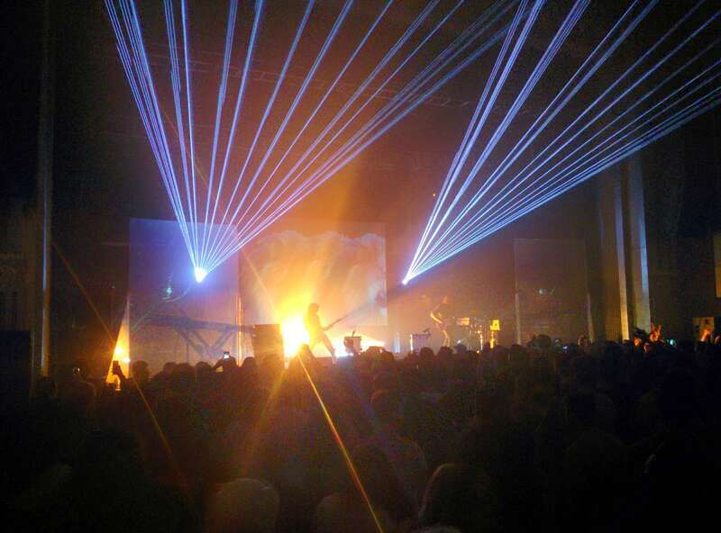 Ratatat performing at Pomona Fox Theater, illustrating the laser light show included in the performance.