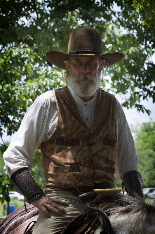 Man on horseback at the Butler Longhorn Museum Wild West Show in League City