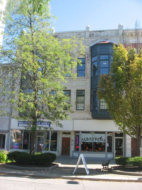 Front of the Redington Block, located at 140 Middle Avenue in Elyria, Ohio, United States.  Built in 1890, it is listed on the National Register of Historic Places, and it is part of a Register-listed historic district, the Elyria Downtown-West