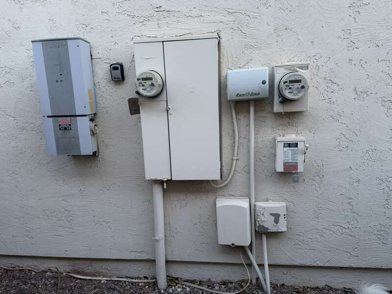 Residential split-phase electric service entrance and meter in Arizona with solar PV