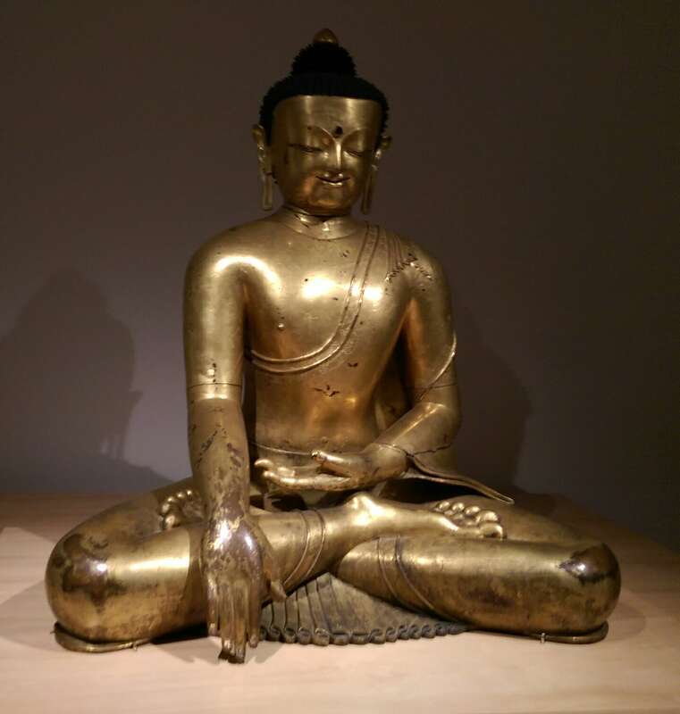 A gilt bronze statue on display at the Berkeley Art Museum Pacific Film Archive. Photo by Jim Heaphy.