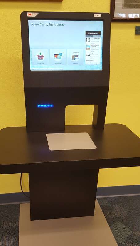 Self checkout station at the John H. Dickerson Heritage Library, Volusia County, Florida