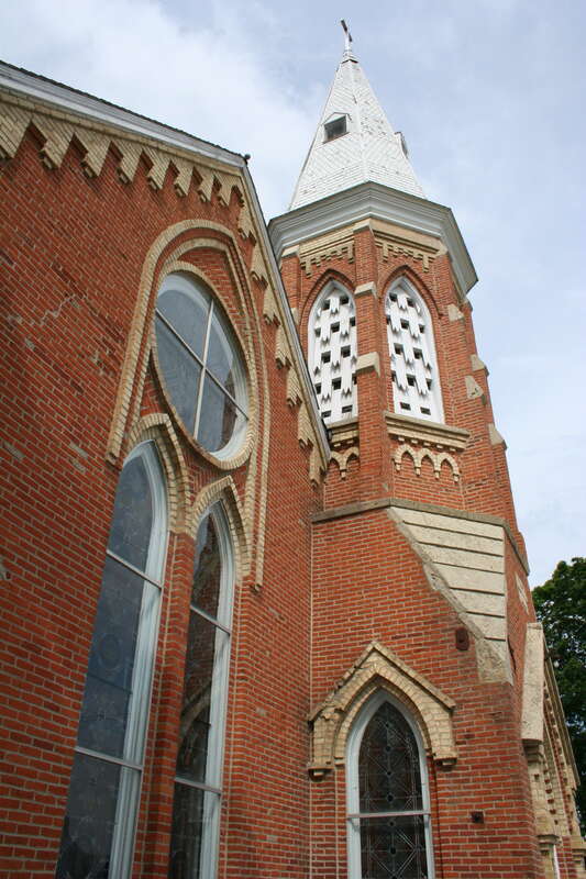Steeple and front peak of the historic Spring Valley Methodist Episcopal Church, now part of a Laura Ingalls Wilder Museum, at 221 West Courtland Street in Spring Valley, Fillmore County, Minnesota.