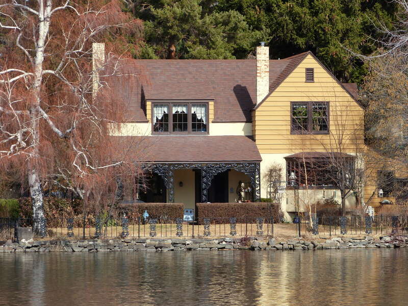 The historic B. A. and Ruth Stover House (built 1911), located at 1 Northwest Rocklyn Road in Bend, Oregon, United States, is listed on the US National Register of Historic Places. Photo is taken across Mirror Pond and the Deschutes River from Drake