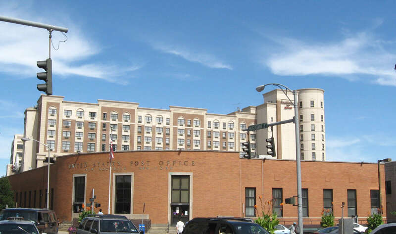 Looking northeast at en:U.S. Post Office (New Rochelle, New York), (NRHP) on a sunny midday.