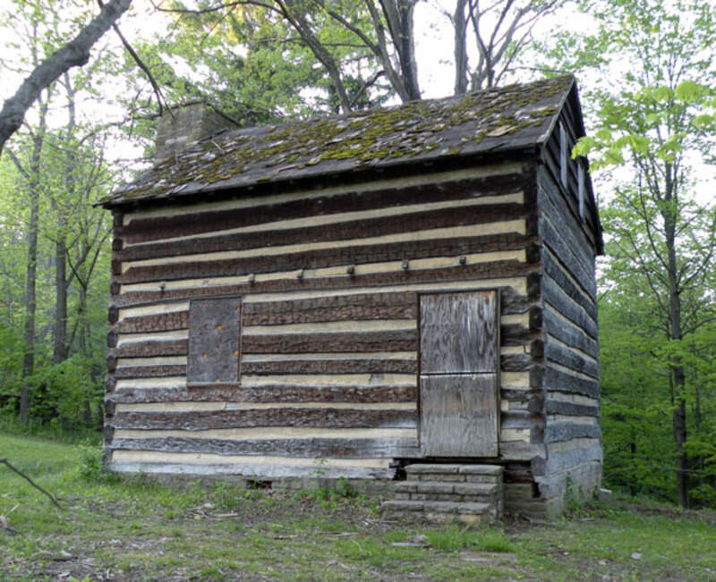 Picture of Walker-Ewing-Glass Log House, located on Pinkerton Run Road in Settler's Cabin Park not far from the park's Maintenance Center, on May 9, 2010. Settler's Cabin Park gets its name from this log house. It may have been built in the 1780s by
