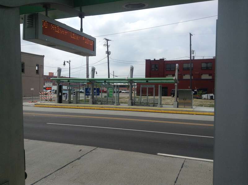 View across Division Avenue to the southbound station, resurfacing work just being completed.