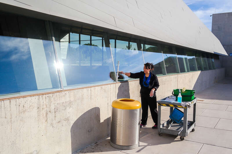 A window washer at the Arizona Science Center