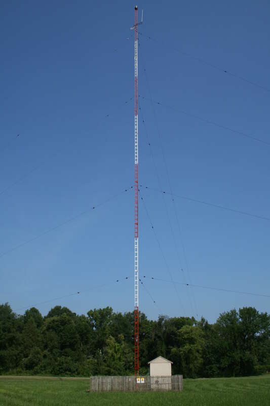 A mast radiator antenna for an AM radio station transmitter in Chapel Hill, North Carolina.  The radio frequency current from the transmitter is applied directly to the steel lattice tower, which acts as a monopole antenna element.  The tower is